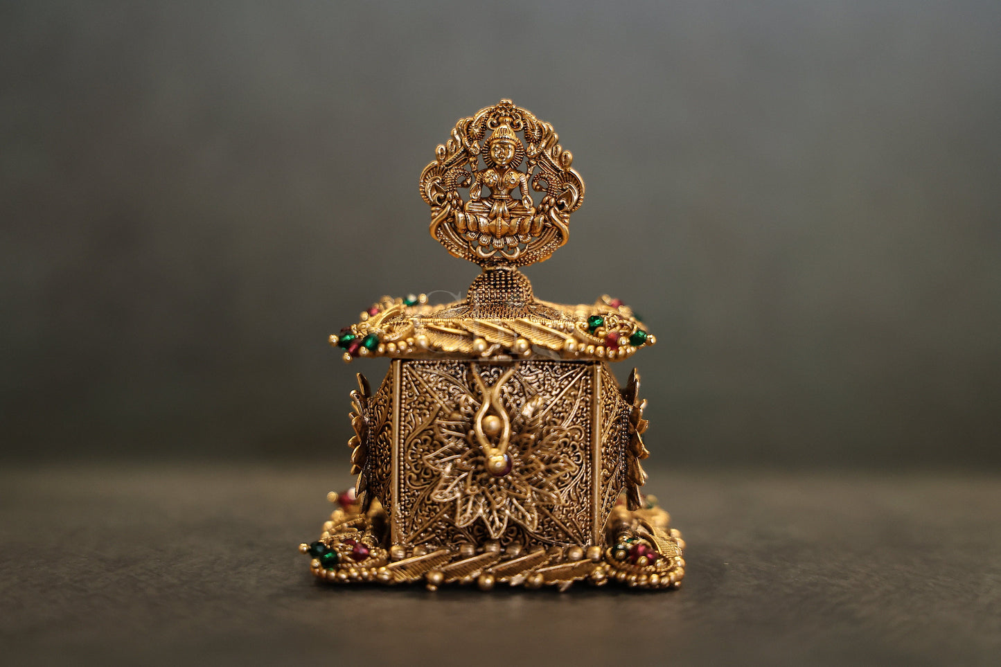 Antique brass kungumachimizh scrollwork