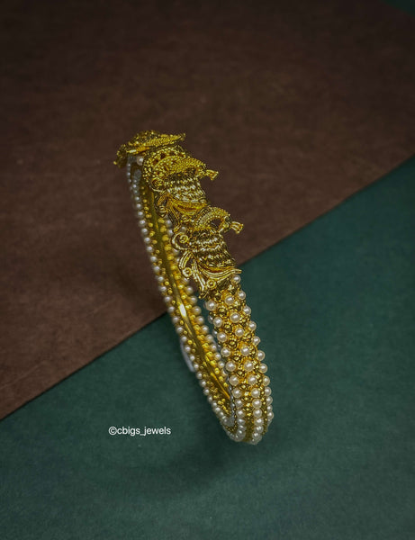 Beautiful Antique Finish Pearl Kada studded with Rice Pearls