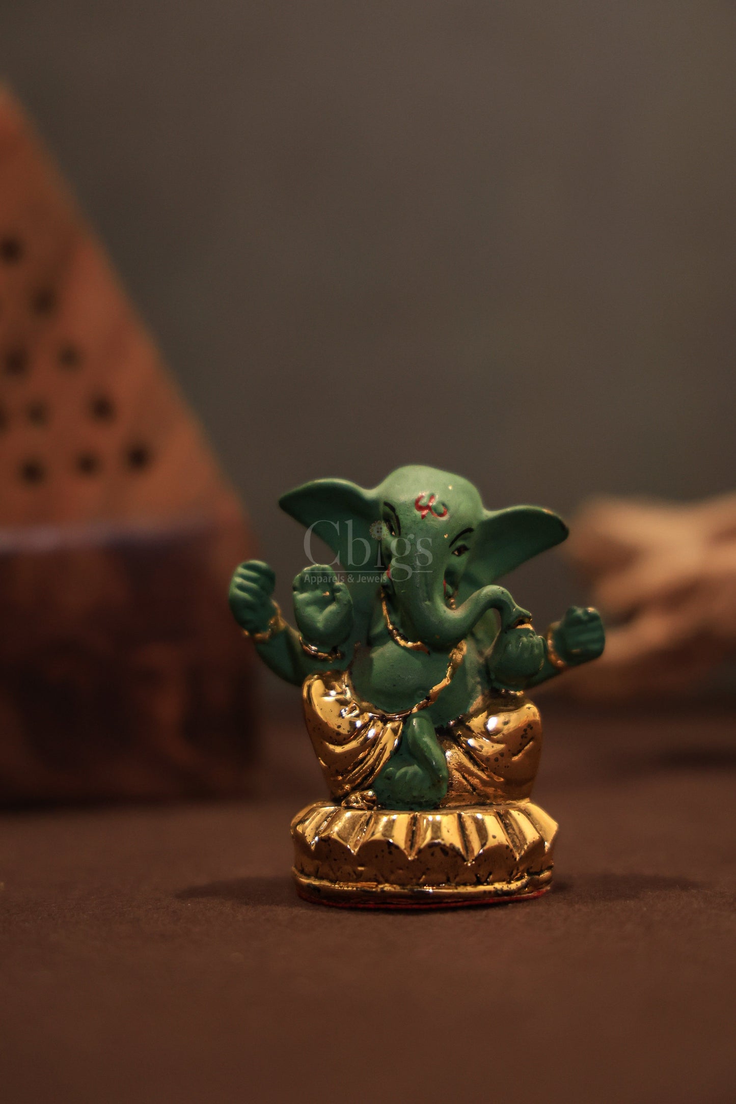 Vinayagar idol hand painted green