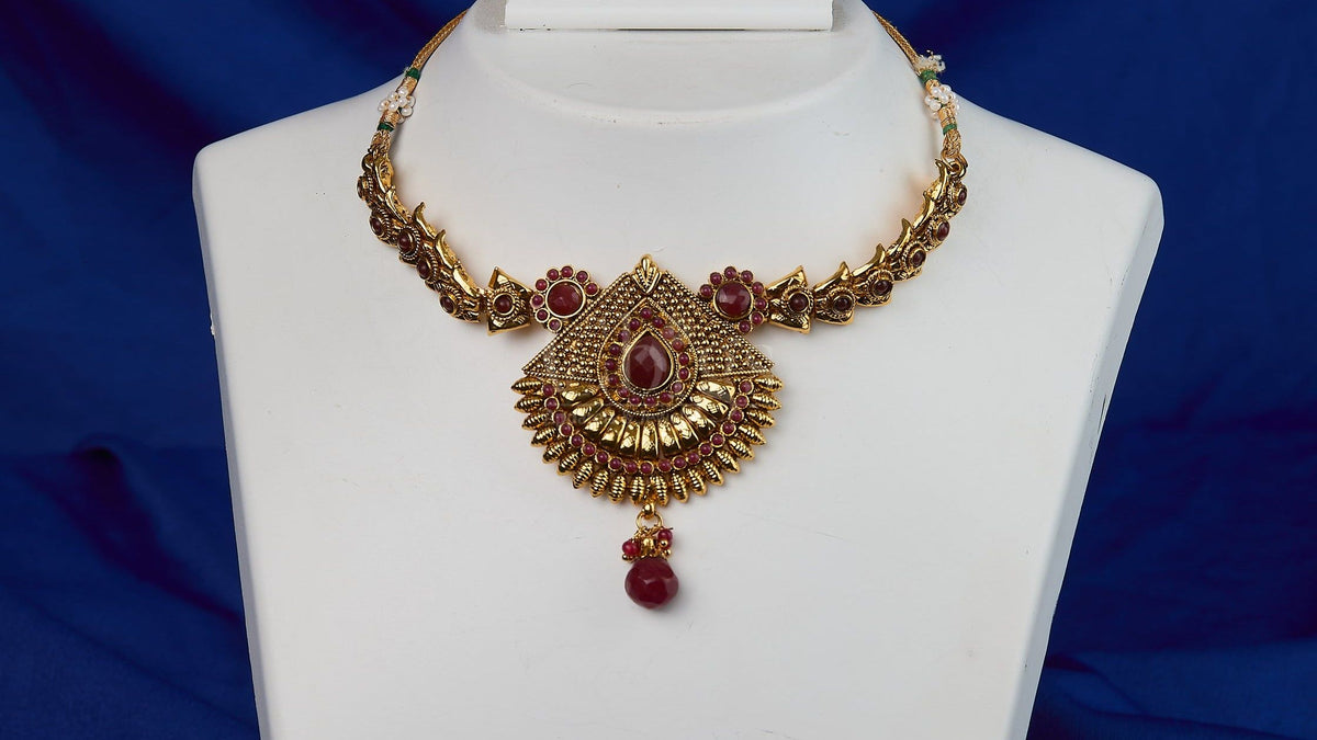 Antique Ruby Sunburst Temple Pendant Necklace